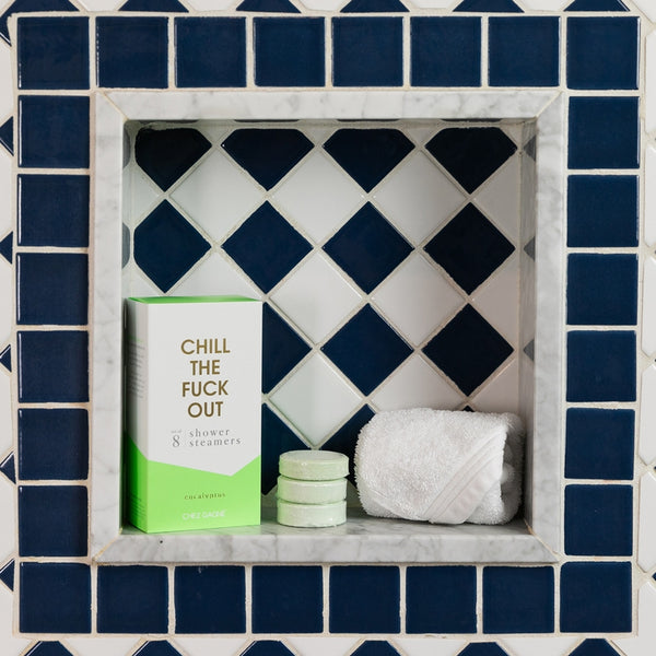 box of shower steamers inside the shower