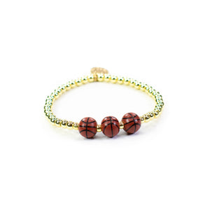 18kt gold beaded stretch  bracelet with 3 basketball  charms