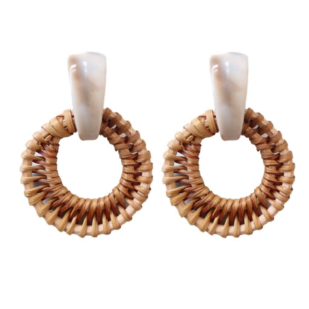 round, tan colored woven rattan earring  with cream tortoise topper.