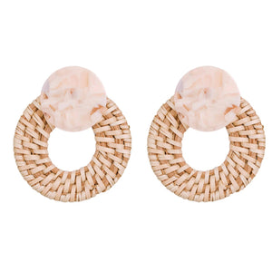 natural wood woven rattan earring with a blonde acrylic circle topper. stud earring.